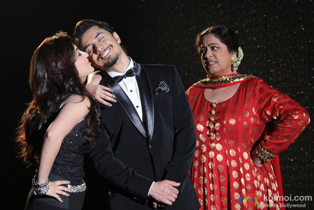 Yami Gautam, Ali Zafar and Kirron Kher in a still from movie 'Total Siyapaa'
