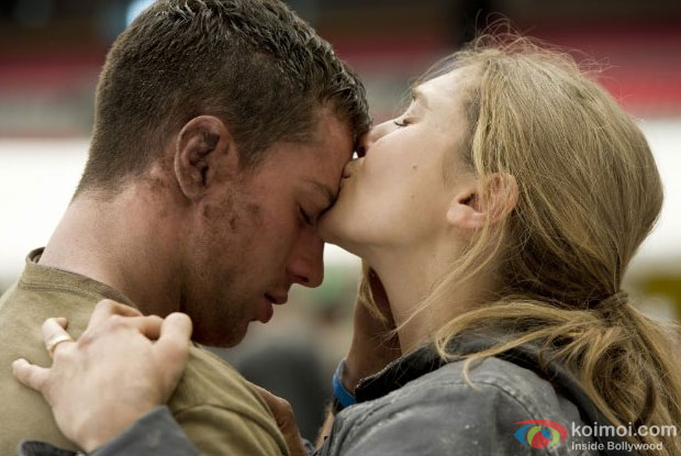 Elizabeth Olsen and Aaron Taylor in a still from movie 'Godzilla'