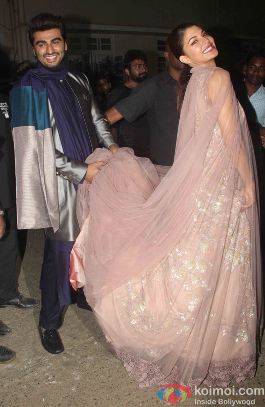 Jacueline Fernandez and Arjun Kapoor displays the creation of fashion designer Manish Malhotra during the opening show of Lakme Fashion Week